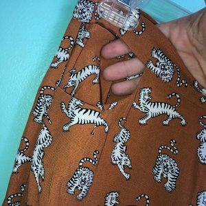 Hip cutout wide leg pants w/ tiger print